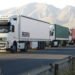 Truck Strike at Home, Silent Talks Abroad