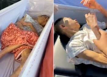 Woman found alive coffin