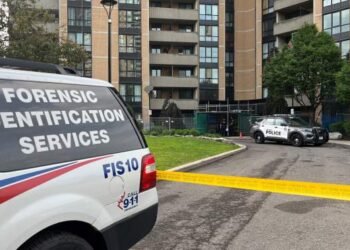 Police vehicles at the scene of a Toronto police shooting near Trethewey and Black Creek drives