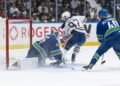 McDavid Shines in Oilers' 9-7 Victory Over Canucks