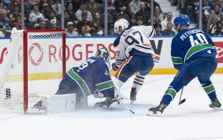 McDavid Shines in Oilers' 9-7 Victory Over Canucks
